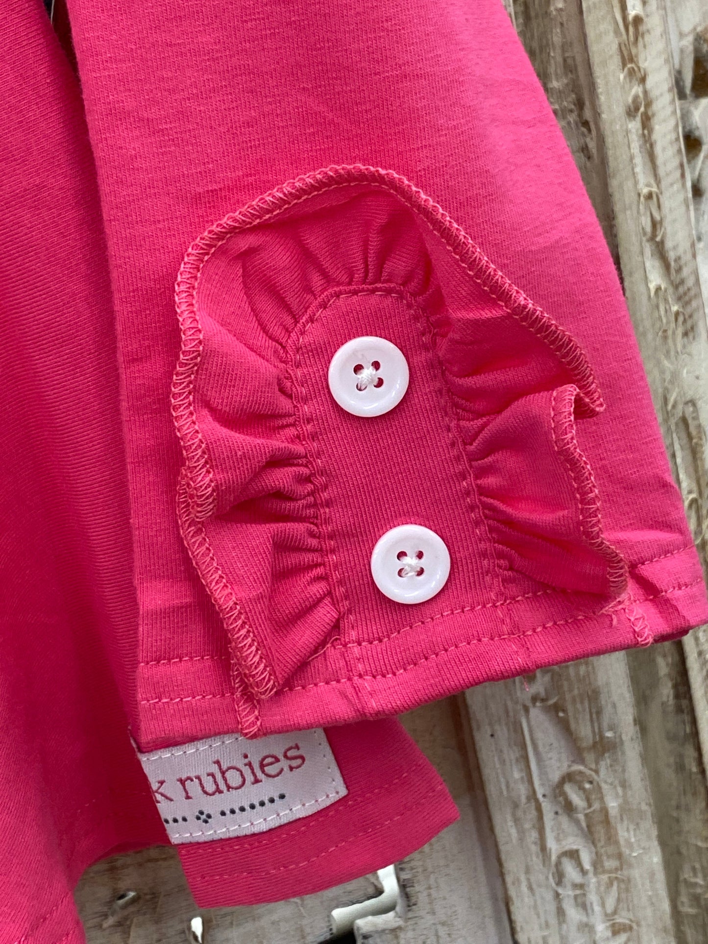 PINK BOW BACK PEPLUM