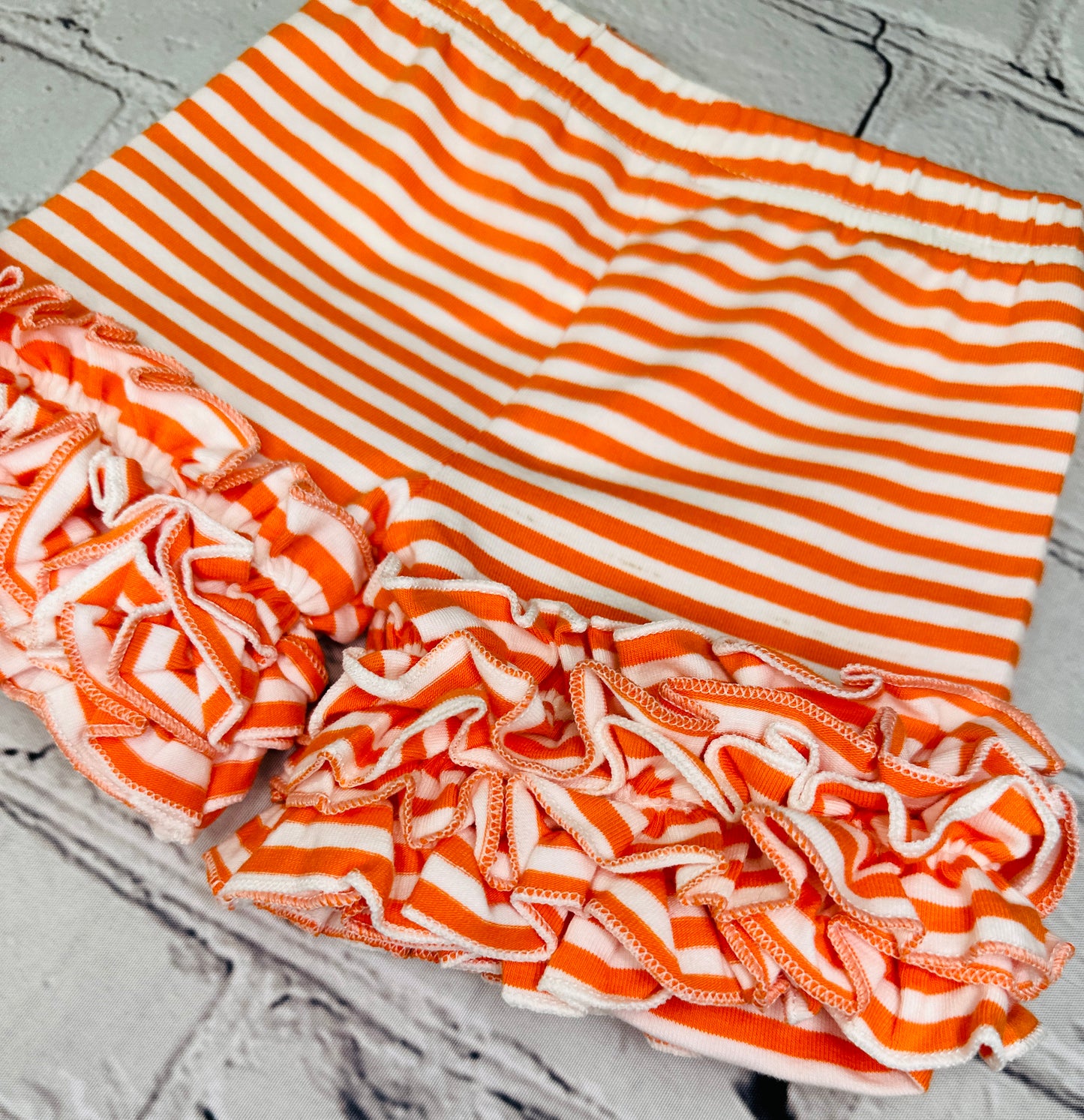 ORANGE STRIPED ICING SHORTS